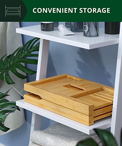 Bamboo bath tray stored on a white shelf with bathroom items.