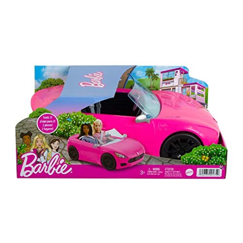 Barbie pink convertible car with dolls in packaging. The car is in the center of the image with two dolls sitting inside it.