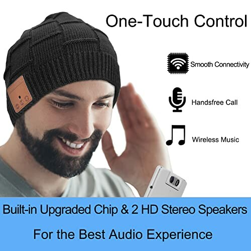 Man wearing a black Bluetooth beanie with built-in speakers and microphone for music and calls.