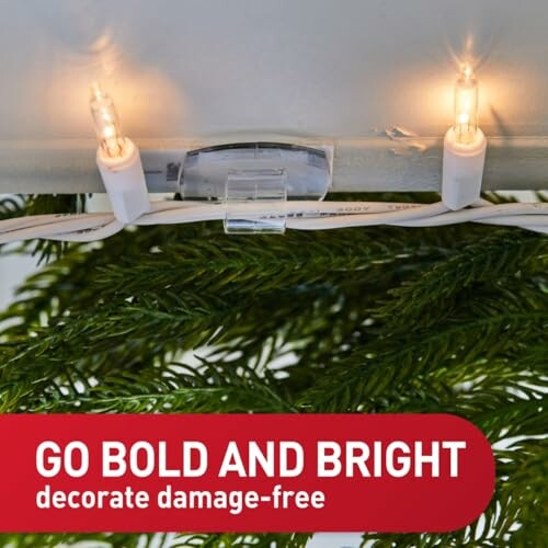 Christmas lights clipped onto greenery with text 'Go Bold and Bright, decorate damage-free.'