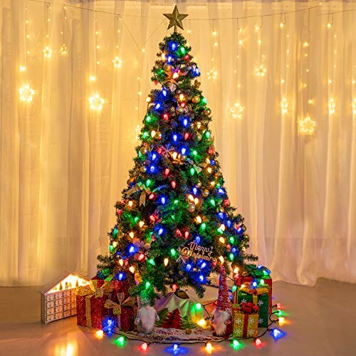 Christmas tree with colorful lights and gifts underneath.