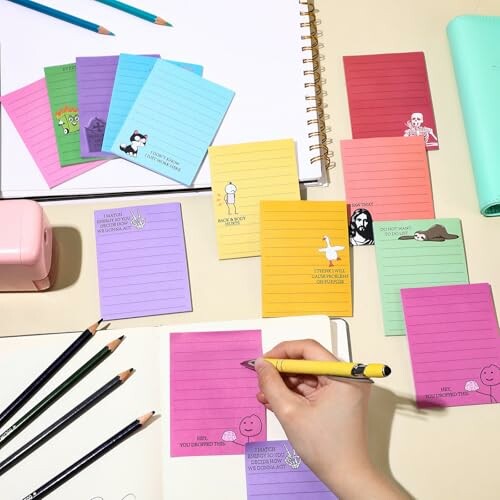 Colorful sticky notes and pencils on a desk.