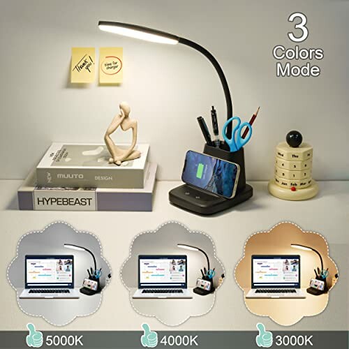 Desk lamp with three color modes and phone stand.