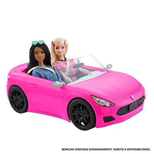 Two dolls in a pink convertible toy car, ready for an adventure.