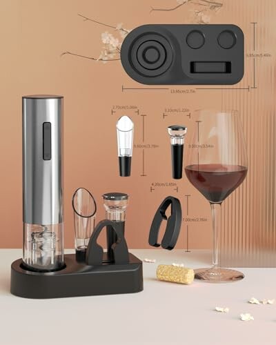 Electric wine opener set with accessories and a glass of red wine