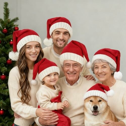 Family with Santa hats and a dog by a Christmas tree.