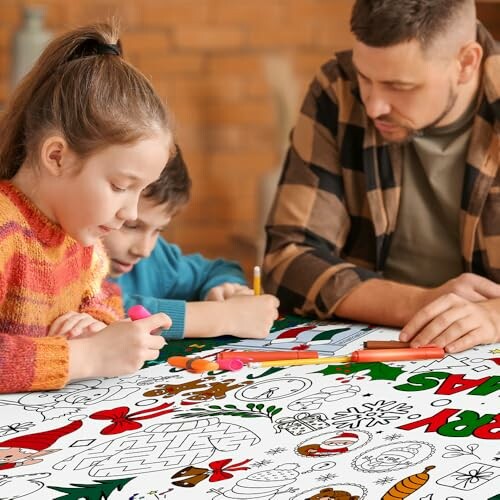 Children and adult coloring on a large paper with festive designs.