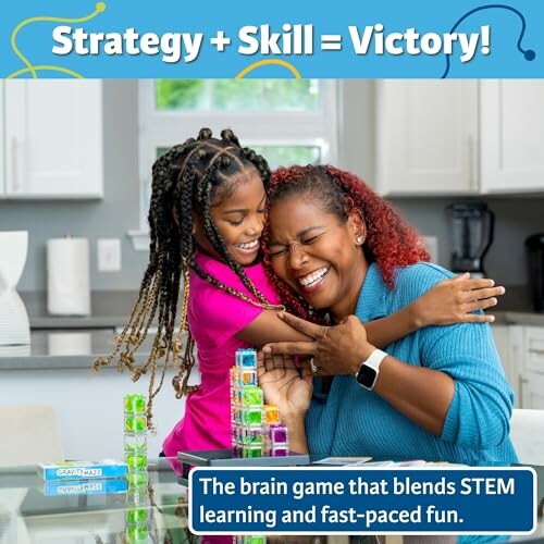Mother and daughter enjoying a brain game together in a kitchen.