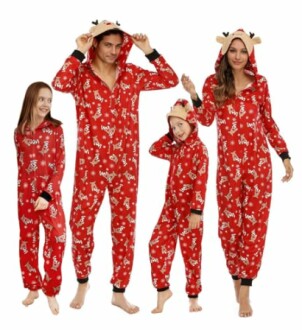 Family wearing matching red reindeer onesies