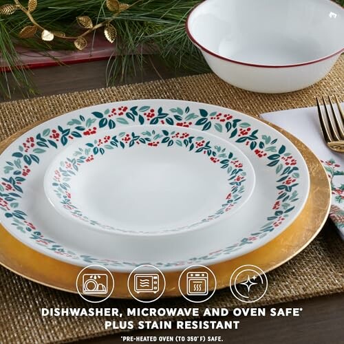 Festive dinnerware set with decorative plates and bowls on a table.