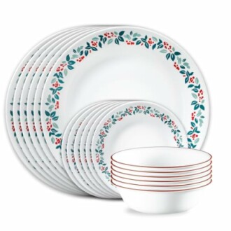 Floral patterned dinnerware set with plates and bowls.