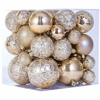 Box of assorted gold Christmas baubles.