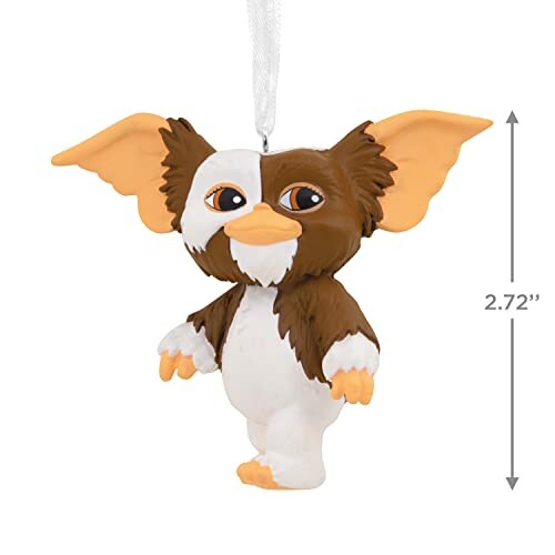Figure of a brown and white creature with large ears, used as an ornament.