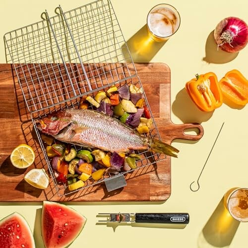 Grilled fish with vegetables on a wooden board, surrounded by fruit and drinks.