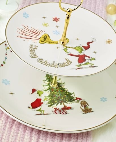 Two-tiered plate stand with Grinch Christmas designs.