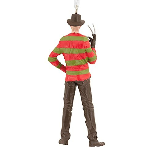 Back view of a horror-themed figurine with striped sweater and clawed glove.