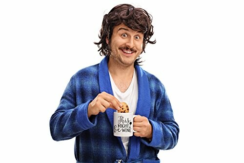 Businesswoman holding a mug in an office setting.