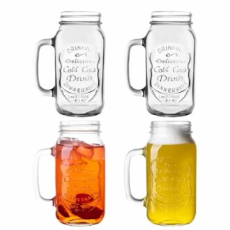 Four mason jar drinking glasses, two empty and two filled with beverages.