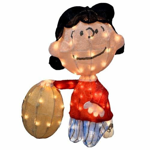 Festive light decoration of a cartoon character holding a ball.