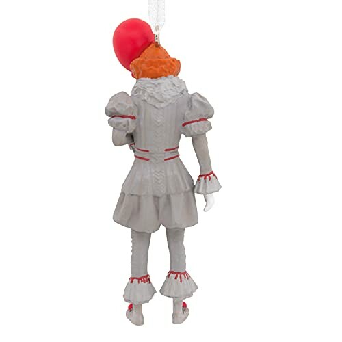 Back view of a clown ornament with a red balloon.