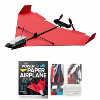 Red paper airplane kit with book and accessories.