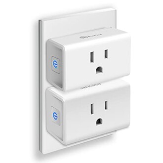 Smart plug outlets stacked in a wall socket