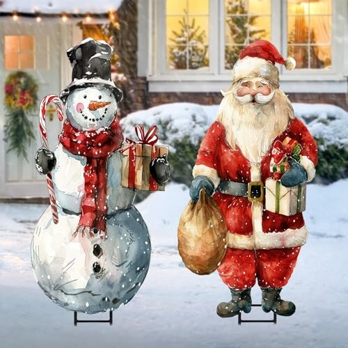 Snowman and Santa Claus decorations in a snowy yard.