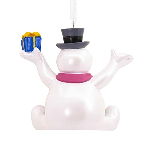 Snowman figurine with top hat and gift