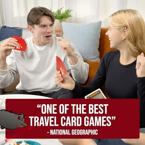 Two people playing a card game on a couch with a review quote from National Geographic.