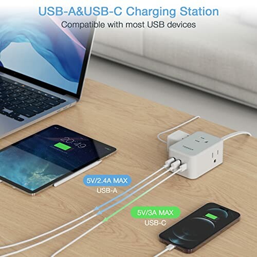 USB-A and USB-C charging station with devices. Perfect for charging multiple devices at once.