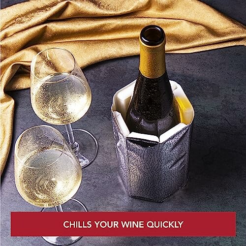 Wine bottle in chiller with two filled glasses.
