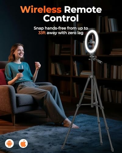 Woman using wireless remote control with a ring light tripod.