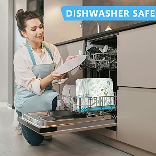 Woman loading a dishwasher with plates in a kitchen setting.