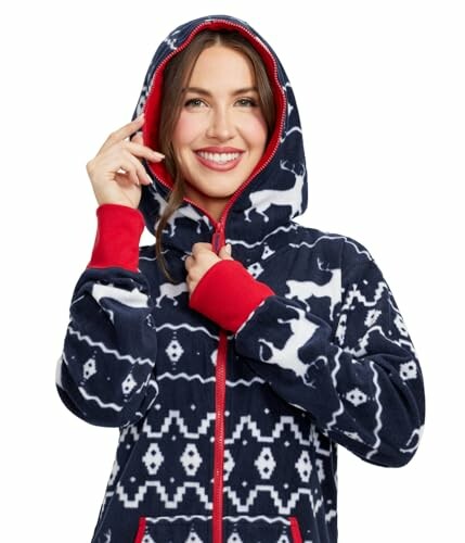 Woman in a reindeer pattern onesie with hood