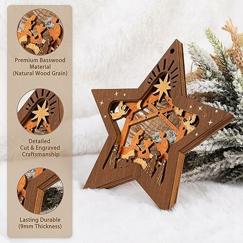 Wooden star ornament with nativity scene and snow-covered branches.